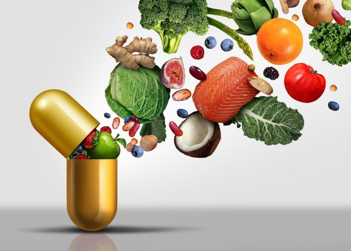 Natural herbs and capsules used as PCOS natural supplements.